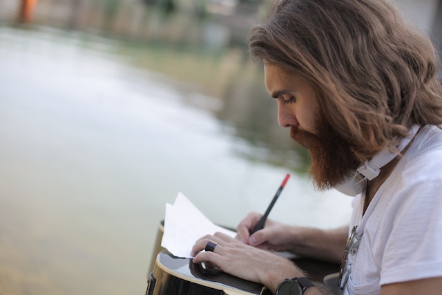 A man writing a poem.
