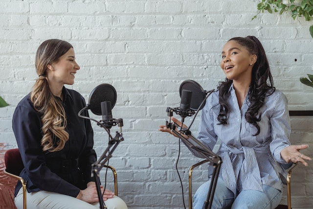 Two women doing a podcast.