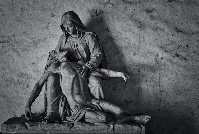 A sculpture of Jesus being held by his mother, Mary, one of the mothers in the Bible.