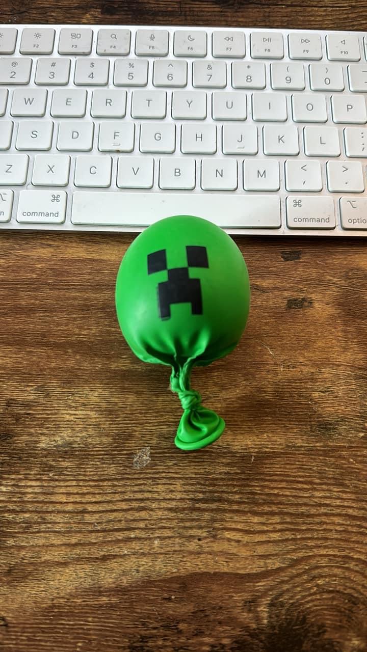 Sad face stress ball.