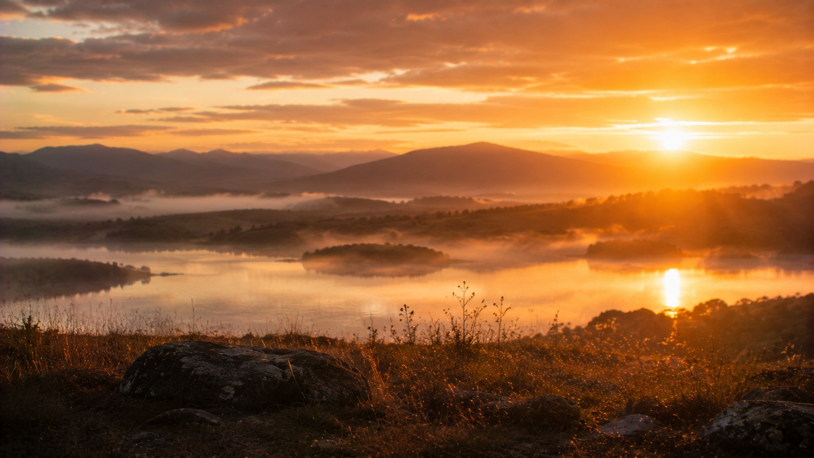 Dawn slowly breaking over a still landscape, an image of waiting on God