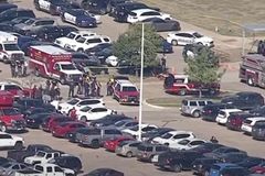 Texas high school shooting suspect turns himself in after wounding 4