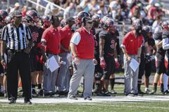 College football coach, Ignatian scholar team up for video project