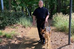 Dog is ‘visible guardian angel’ for blind Virginia priest | Crux Now