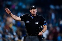Giving it all to God: umpire, ordained minister returns to World Series | Baptist Press
