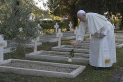 Pope Francis celebrates All Souls’ Day Mass at military cemetery in Rome