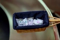 Suit accuses Kentucky priest of pocketing church donations