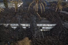 Volcanic lava threatens church, more homes on La Palma