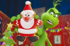 Bishop plays Grinch, tells Massgoers Coca Cola created Santa Clause