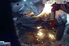 'Seconds Matter': Nail-Biting Bodycam Video Captures Quick-Thinking Cops Rescuing Driver From Car 'Engulfed in Flames'
