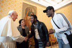 Pope Francis celebrates his 85th birthday with refugees he helped bring to Italy