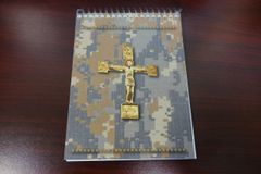 Knights of Columbus volunteers sending rugged prayer books to military personnel
