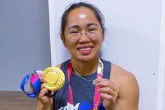 Gold medalist weightlifter Hidilyn Diaz inspires the Philippines with her victory and Catholic devotion