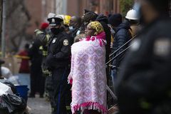 Fire claims lives in crowded Philadelphia row house