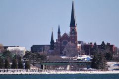 Maine's Catholic churches will continue attendance at Mass, while ecumenical group urges online services