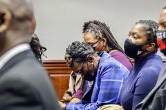 Men convicted in Arbery death given life sentences