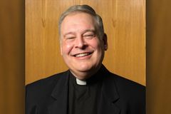 The Final Dispatch of Father Hudgins, a Lansing priest who died in a road accident