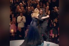 Watch Adele Break Down on Stage When Her Old English Teacher Surprises Her Mid-Concert - RELEVANT