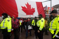 Truckers Hold Their Ground Despite Threats of Crackdown