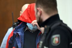 German court convicts Catholic priest of abusing girls