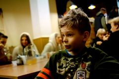 Displaced Ukrainians find shelter in Lviv churches, schools, orphanage