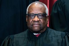 Justice Thomas Hospitalized With Infection, High Court Says