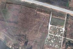 Suspected mass graves seen near Mariupol