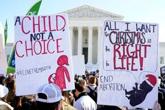 America at a Crossroads on Abortion: Are Lawmakers Trying to Intimidate the Court Before the Roe Ruling?