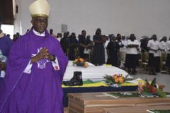 Nigeria funeral for church attack victims draws anger, tears