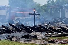Wooden cross is only thing left standing after historic church burns down: 'A sign from the Lord'