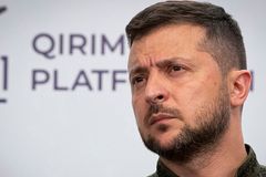 Russian rockets kill 15 in attack on train station