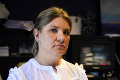 Dozens charged with conning food program