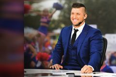 Tebow Auctions Heisman Trophy to Raise $1M for Kids in Need, Inspired by His Hero Parents