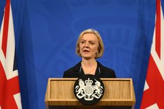 UK’s Liz Truss reverses tax cuts, sacks treasury chief