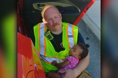 'This is Why I Do the Job’: Firefighter Cradles Baby After Car Crash
