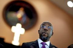 Walker, Warnock Offer Clashing Religious Messages in Georgia