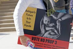 Soros, Bloomberg pump millions into Michigan abortion push