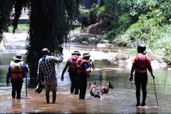 At least 14 dead after flash flood hits baptism