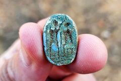 Israeli Middle School Students, Guide, Surprised by 3,000-Year-Old Discovery: a Scarab Designed as Dung Beetle