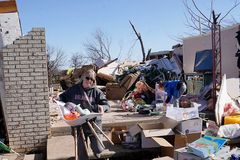 Tornadoes, blizzard-like storms tear across the United States