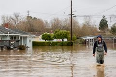 California storms cause widespread flooding, mudslide warnings