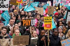 U.K. teachers, civil servants join largest mass strike in decade