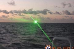 China hazes Philippine Coast Guard vessel