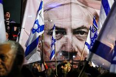 Netanyahu delays judicial overhaul after protests