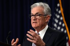 Fed softens stance on inflation control