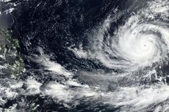 Typhoon Mawar hits U.S. territory with high winds
