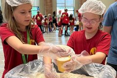 Kids at Texas church pack 9,000 meals for the needy for Vacation Bible School project