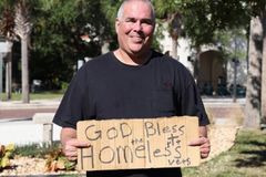 Georgia town rescinds citation for man holding 'God bless the homeless vets' sign at City Hall