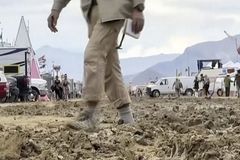 Rain leaves Burning Man attendees stuck in the mud