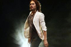 Russell Brand Suggests God and Sobriety Have Changed Him as a Man